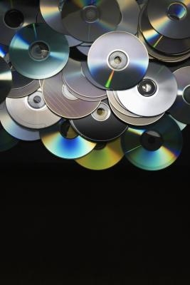 Cómo combinar CDs y libros en iTunes
